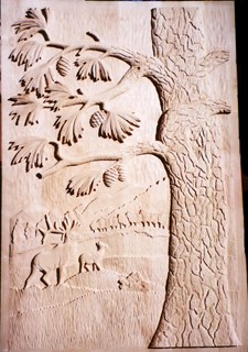 Carved door panel with deer