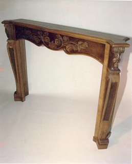 Carved oak fireplace mantle