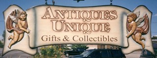 Carved Hanging Sign with Cherubs
